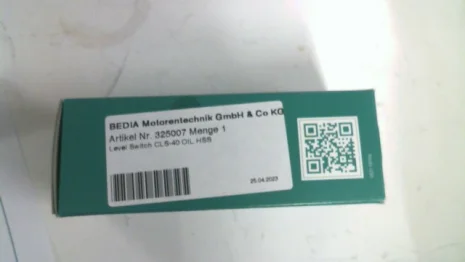 325007