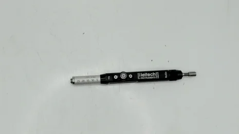 303807